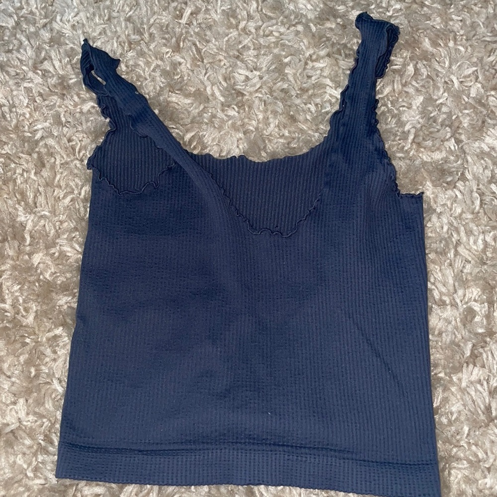 Crop Top. It is navy blue and lined.